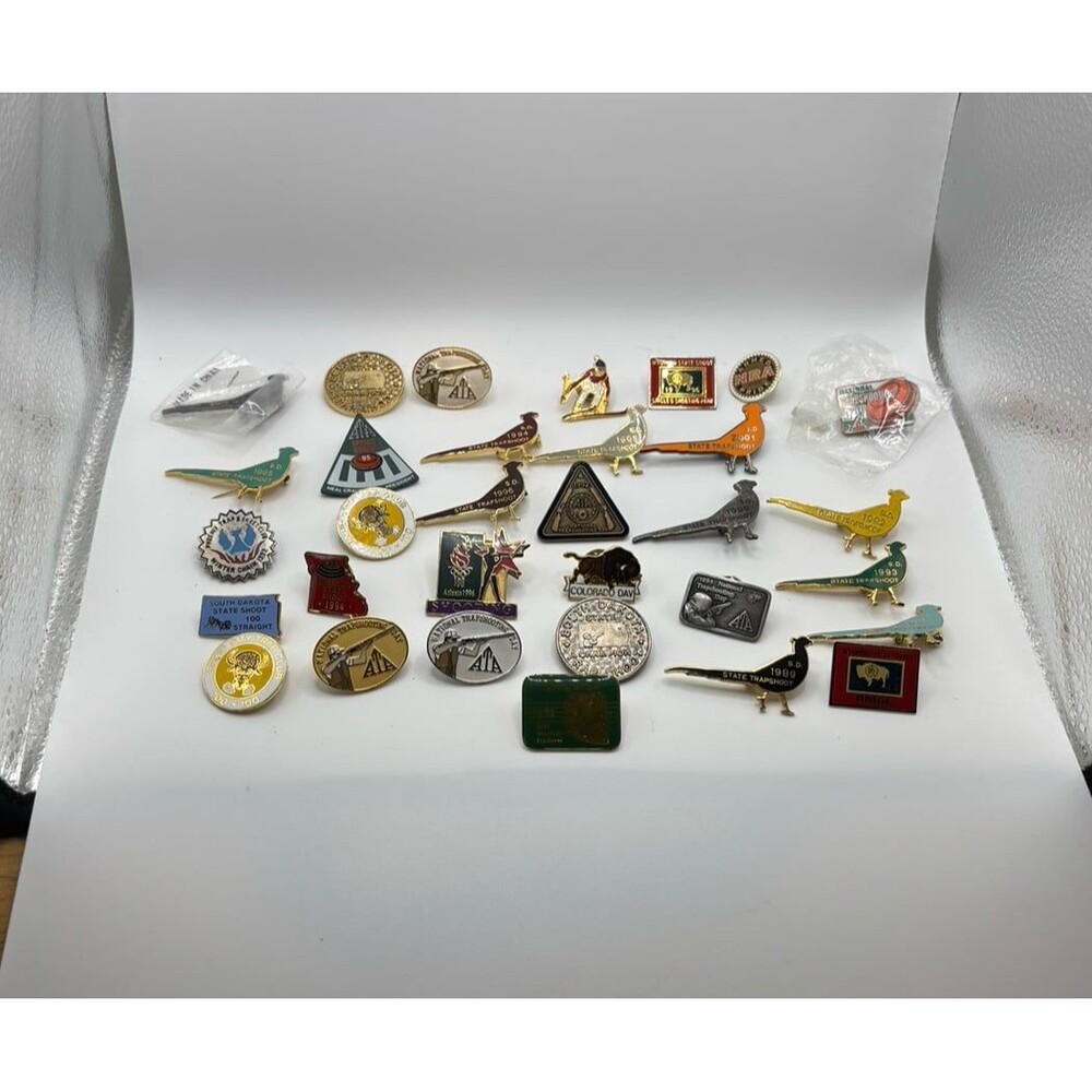 Lot of 32 South Dakota, ATA, and Assorted Trap Shooting Pins